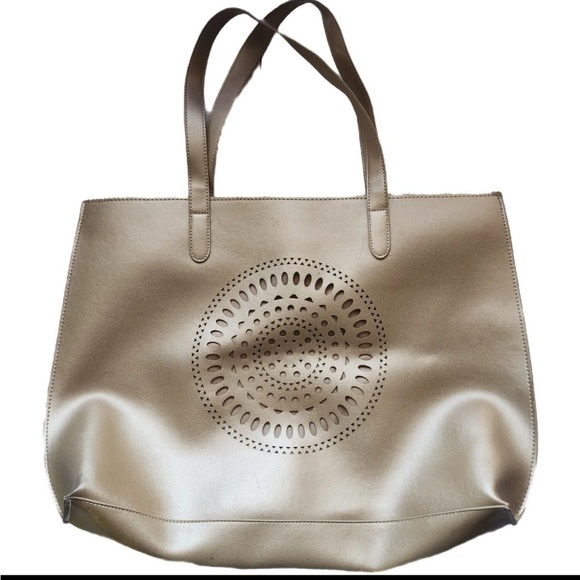 Neiman Marcus Handbags - Neiman Marcus Gold Tone Lazer Cut Tote Bag - Some marks see photos